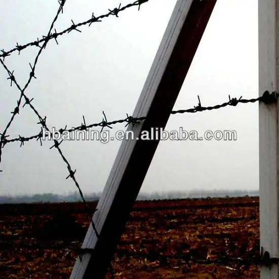 barbed wire picket fence