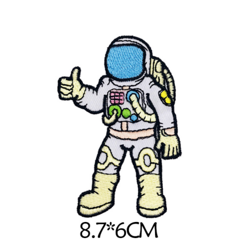 Kartun astronot mengolah pakaian ruang bordir