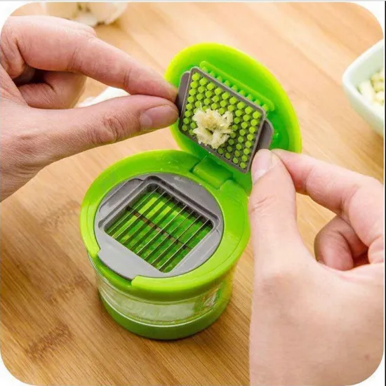 kitchen tool plastic vegetable ginger garlic press chopper with storage container
