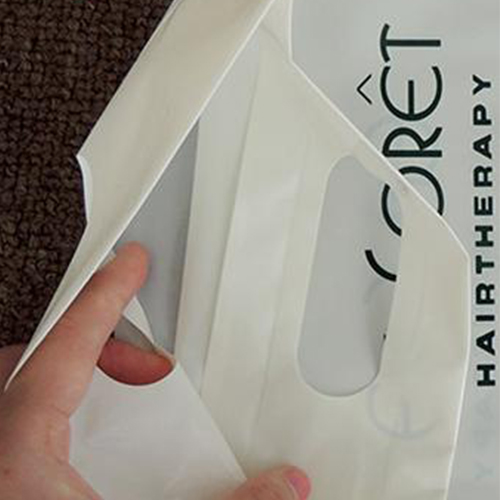 fold over die cut handle bag