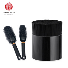 Heat resistant brush filament for thermal round brush