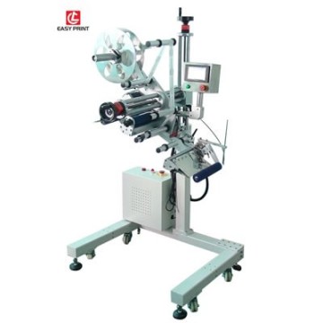 Automatic Garment Packaging and Labeling Head for Assembly Lines