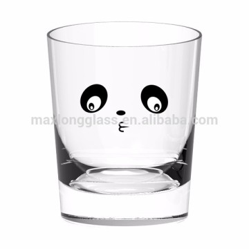 Machine made glass cup with black decal