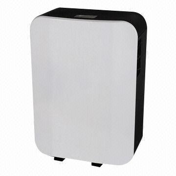 Dehumidifier, movable water, defrost control