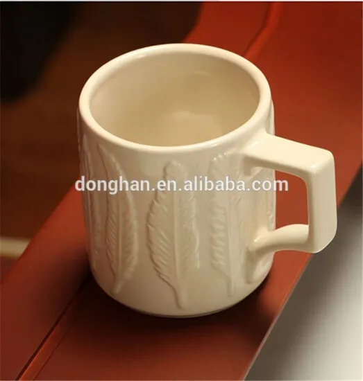 Alibaba market wholesale pure white embossed leaf mug