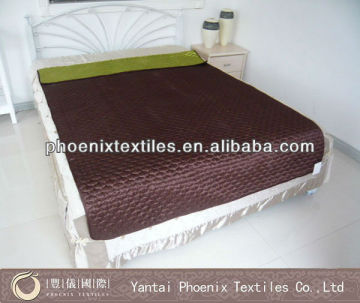 polyester/cotton quilted throw