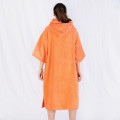 Poncho de voyage en coton tarte coupe orange