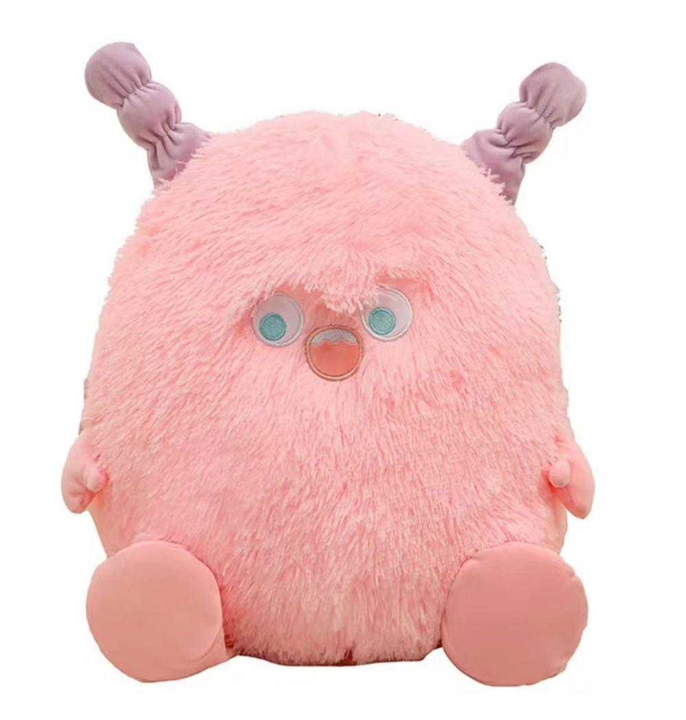 Pequeños animales de peluche de monstruo rosa con coletas