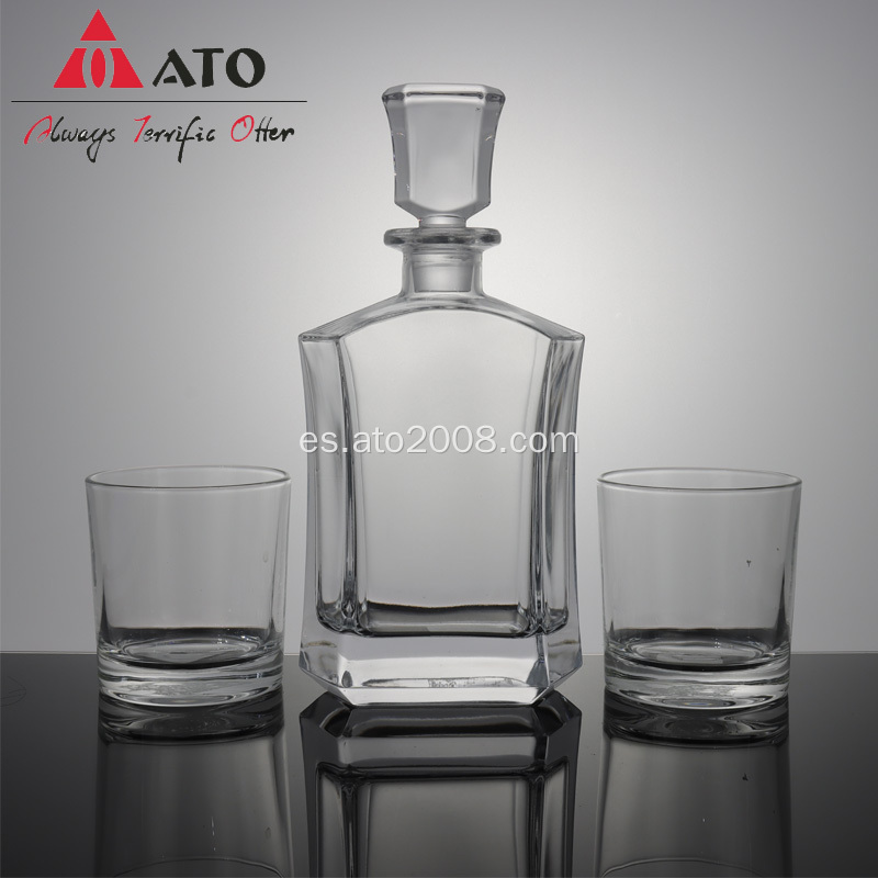 Decantador de whisky de vidrio de giro transparente elegante con vidrio