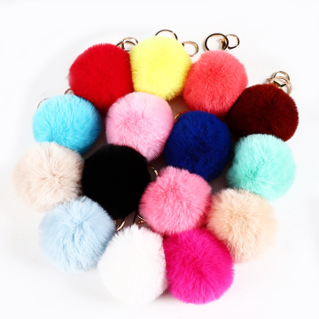 Fur Ball Puffball Designs: Adorable Faux Fur Pom Pom Tail Keychains and Cute Accessories