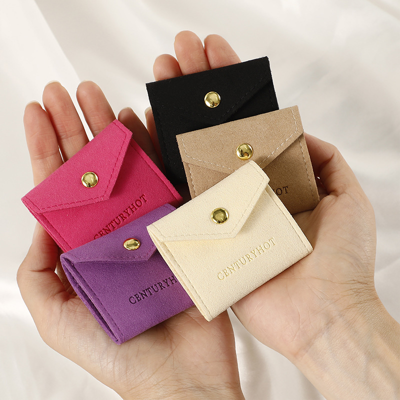Portable slim jewelry storage pouch with snap button