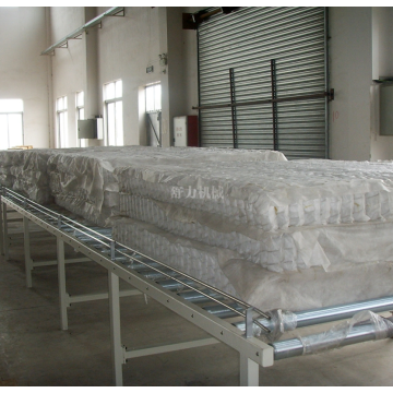 Roller conveyor for mattress production