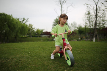 Children Running Bike Slide By Feet