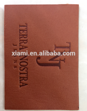 individual design debossed artistic words top layer custom embossed leather label