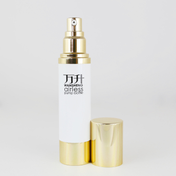 Gold cap with white airless pump bottle