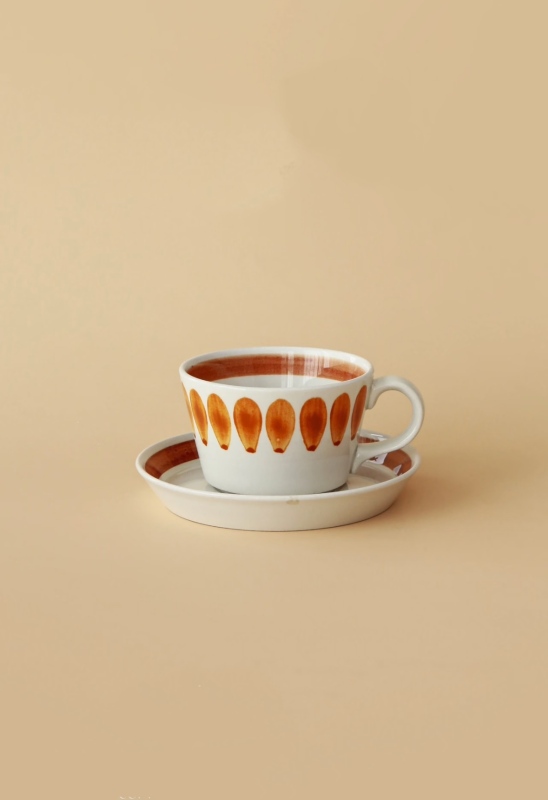 Vintage - style Ceramic Cup and Saucer Set