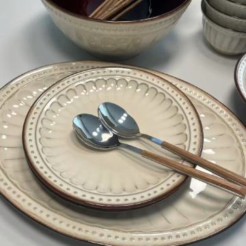 Soft-Hued Ceramic Dinnerware with Dark Accents