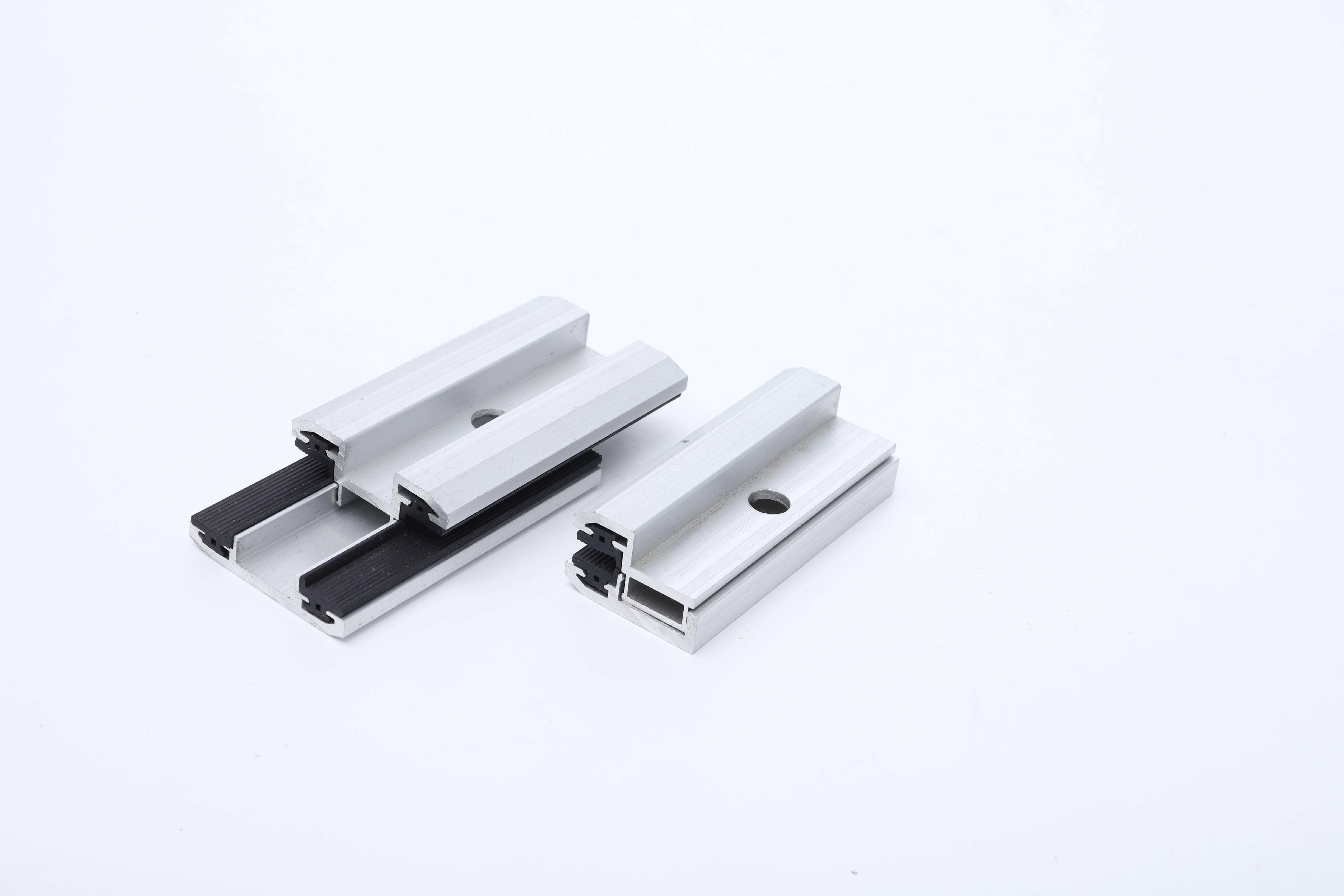 Aluminum end clamps for glass panels