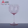 Pink white wine glass and red wine glass