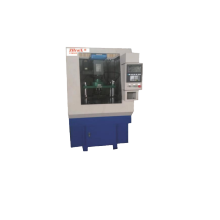 Single-coordinate CNC drilling machine