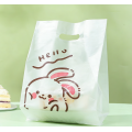 Sac d'emballage de gâteau tenu dans la main en plastique de lapin de dessin animé mignon