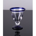 blauwe kleur rand drinkglas beker beker en werper