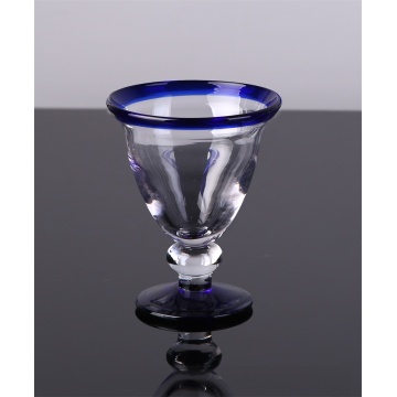 blue color edge drinking glass goblet cup and pitcher