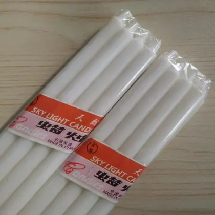 Long white household candles for Madagascar