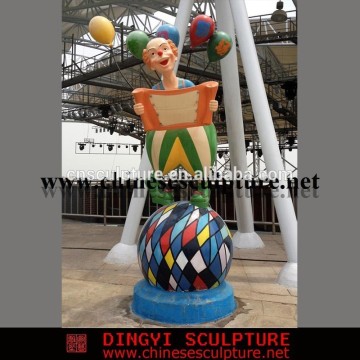 amusement park circus ball sculpture and clown statue