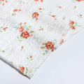 Tejido arrugado de poliéster con estampado de rosas para vestido