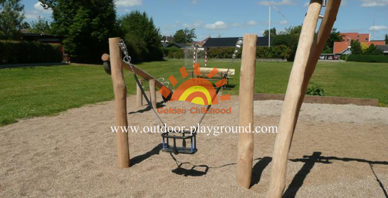 kids swing sets on playground