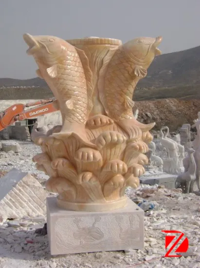 Fountain stone fish sculpture
