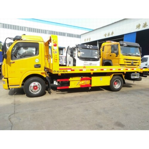 Camion dépanneuse à plat avec grue à flèche articulée