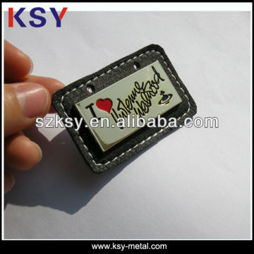 Gold metal tag for leather