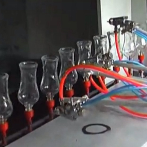 Small glass bottle spray coating machine