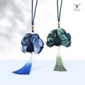 Bolsita étnica con colgante de borla de pavo real de algodón tie-dye