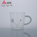 Tema de diseño de diseño de planta linda para beber taza de vidrio