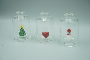 glass bottles with tree