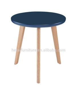 Small round wooden dining table