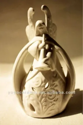 white porcelain fairy statue candle holder
