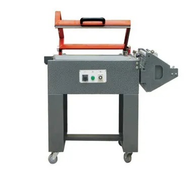 Continuous seal-cut-shrink packaging machine