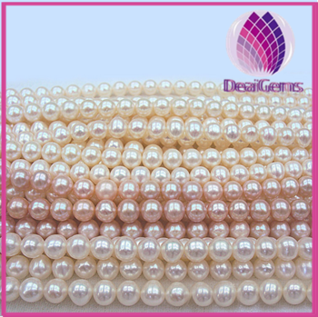 Natural freshwater pearl white / peach / mauve 7-8mm round,A+ grade.
