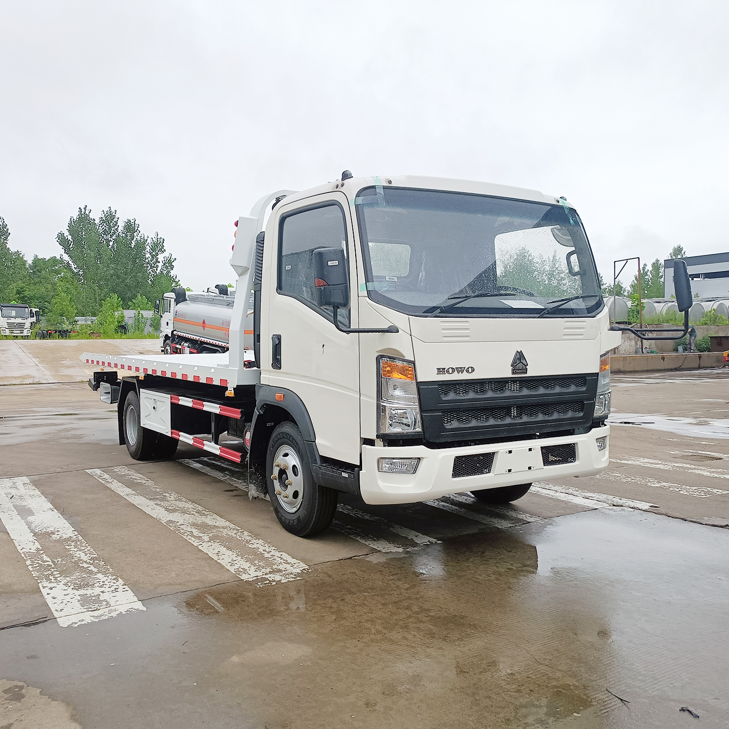 High-performance flatbed tow truck for quick road clearance
