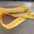 Promotional yellow plastic separating coat zippers