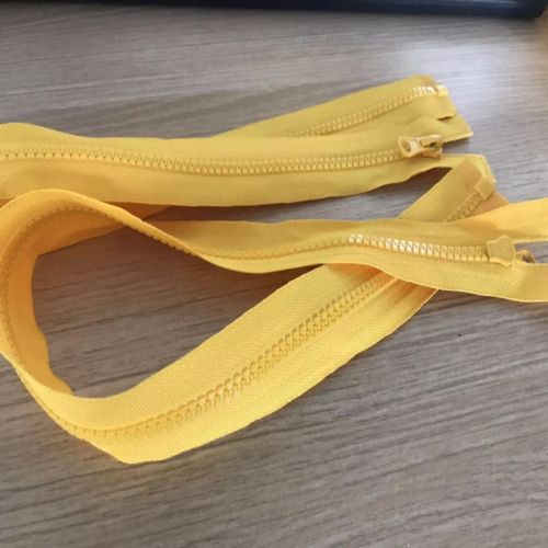 Promotional yellow plastic separating coat zippers