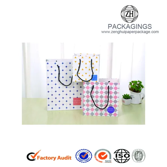 Sweet white art paper gift bags for girls