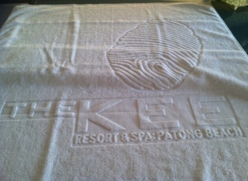 100% cotton towels with jacquard logo