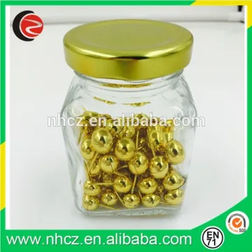 Gold Round Push Pin in Glass Bottle