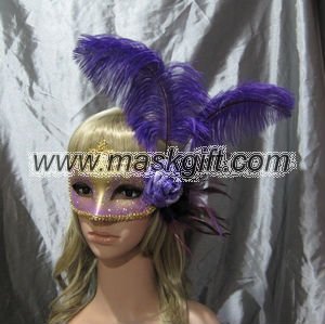 Venetian style purple and gold glitter mardi gras mask