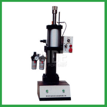 Armature shaft inserting machine